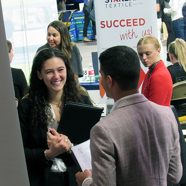student being interviewed at career fair