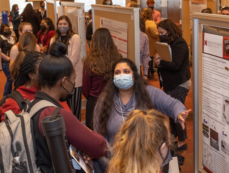 Graduate students present their research findings to each other and to faculty members
